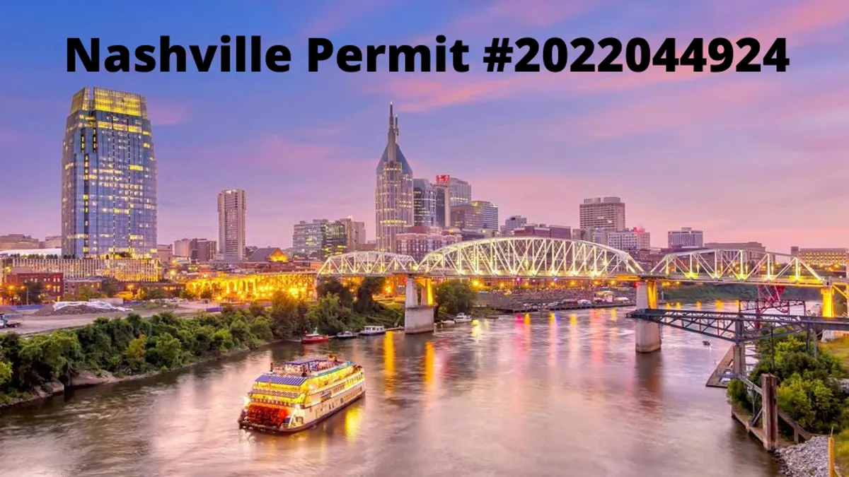 A sweeping view of the Nashville city skyline at sunset, with a classic riverboat gliding along the water and the city’s bridges illuminated in the backdrop. The sky is painted in vibrant hues, and the excitement of the city’s nightlife is palpable from this vantage point.