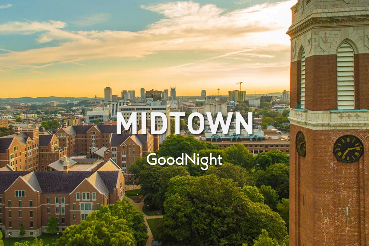 This image features a sweeping view of the city skyline with historic buildings, a prominent clock tower, and ample green space in the foreground. The scene conveys a sense of vibrancy and accessibility, with the heart of the city clearly on display.